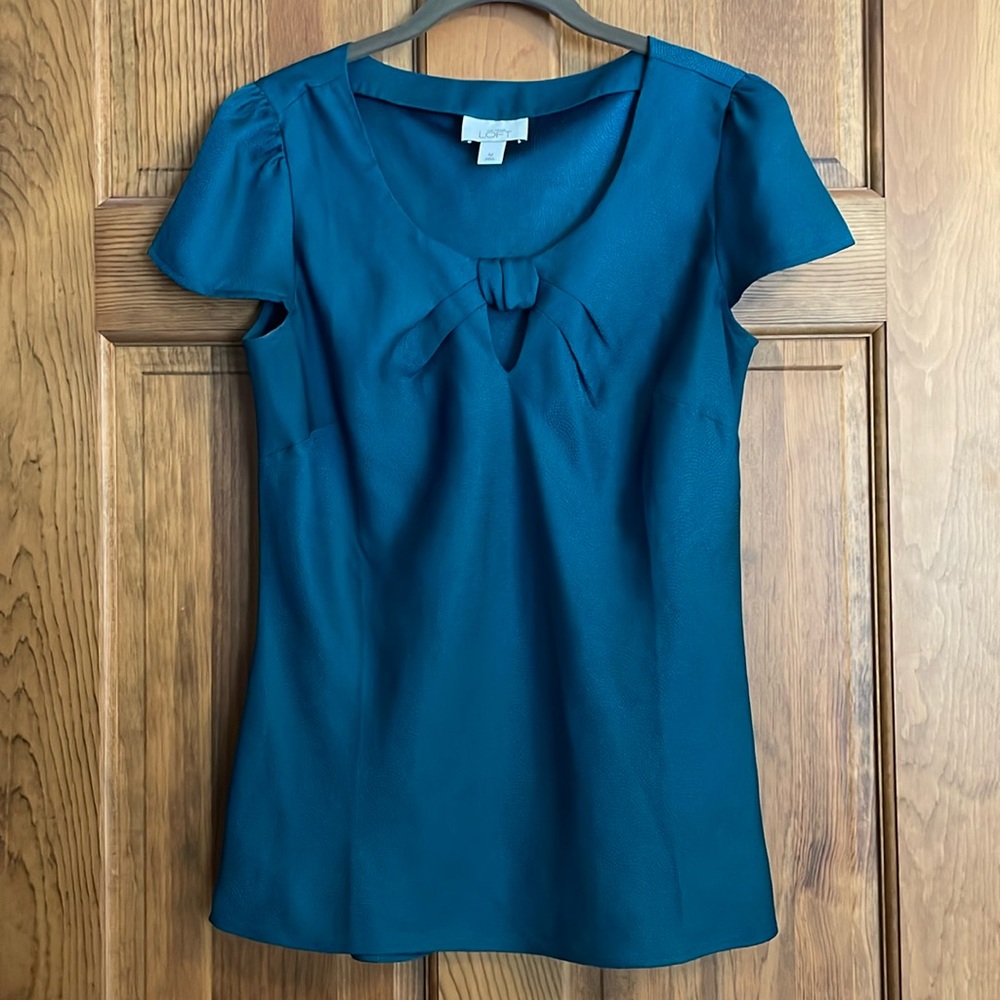 LOFT - emerald green silky top with tons of elegant details.